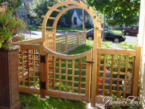 fence for kids western red cedar lattice gate around backyard for kid safety premier fence twin cities st. paul fence contractor