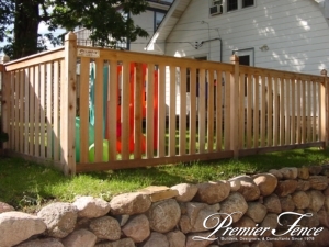 aesthetic Western red cedar design fence around backyard for containment for kids premier fence twin cities fence contractor